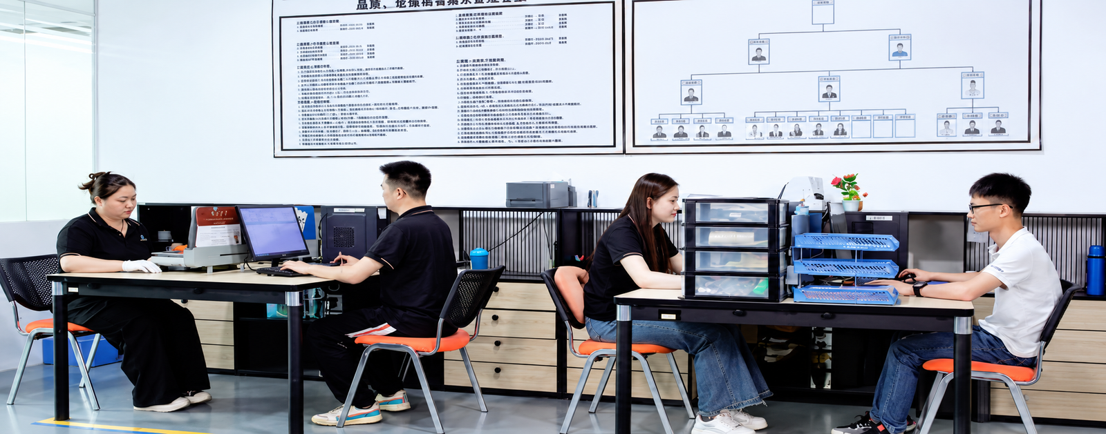 CHENHOTECH open office with orange workstations and staff